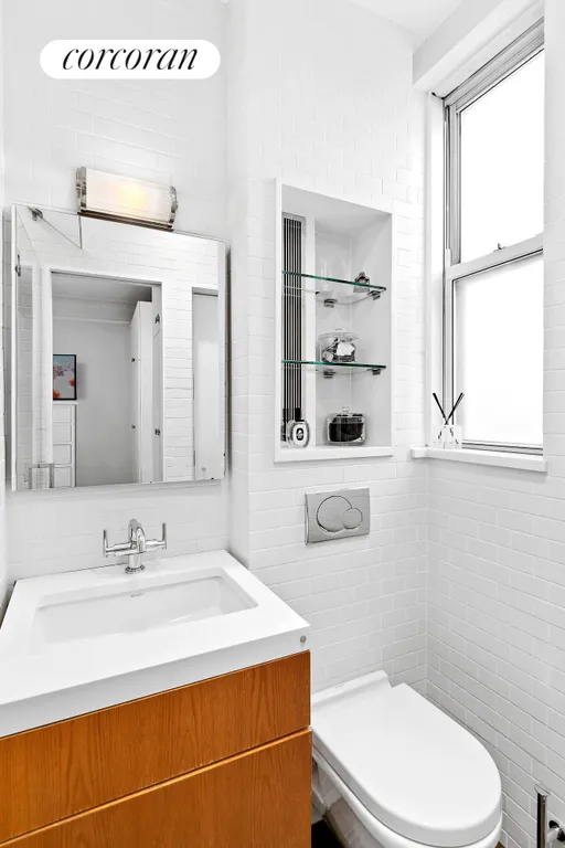 New York City Real Estate | View 780 West End Avenue, 2A | floating vanity and crisp white tiled walls | View 4
