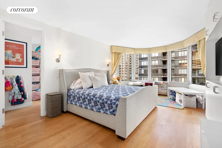 New York City Real Estate | View 44 West 62nd Street, 23DE | Master Bedroom Suite with circular bay window | View 3