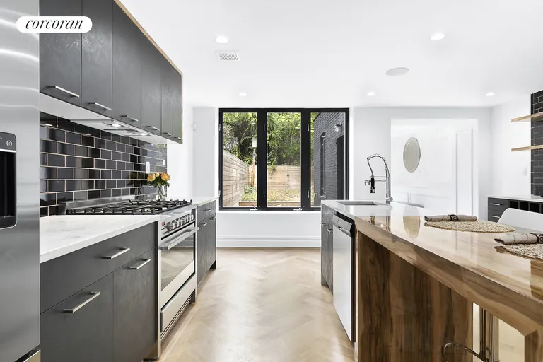 New York City Real Estate | View 229A Vernon Avenue | Massive kitchen island! | View 4