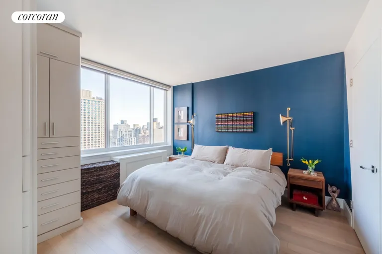 New York City Real Estate | View 389 East 89th Street, 20C | Master bed w/custom wardrobes | View 5