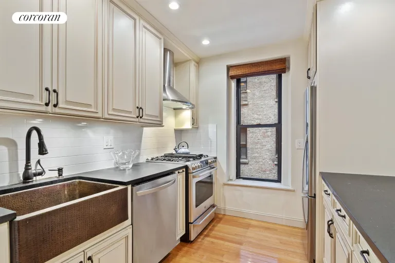 New York City Real Estate | View 302 West 79th Street, 4C | Windowed kitchen with stainless appliances | View 3