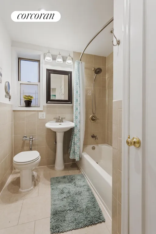 New York City Real Estate | View 9281 Shore Road, 201 | Renovated bathroom with large linen closet | View 6