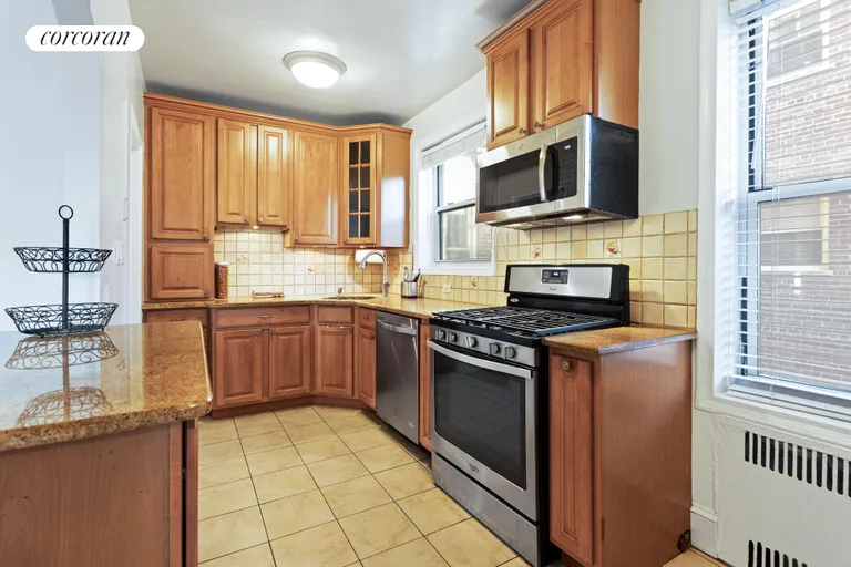 New York City Real Estate | View 9281 Shore Road, 306 | Large kitchen with two windows and lots of storage | View 4