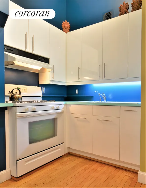 New York City Real Estate | View 718 Broadway, 5C | Sleek white lacquer cabinetry | View 6