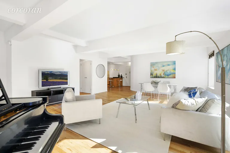 New York City Real Estate | View 315 West 23rd Street, 3B | Living room to kitchen view | View 2