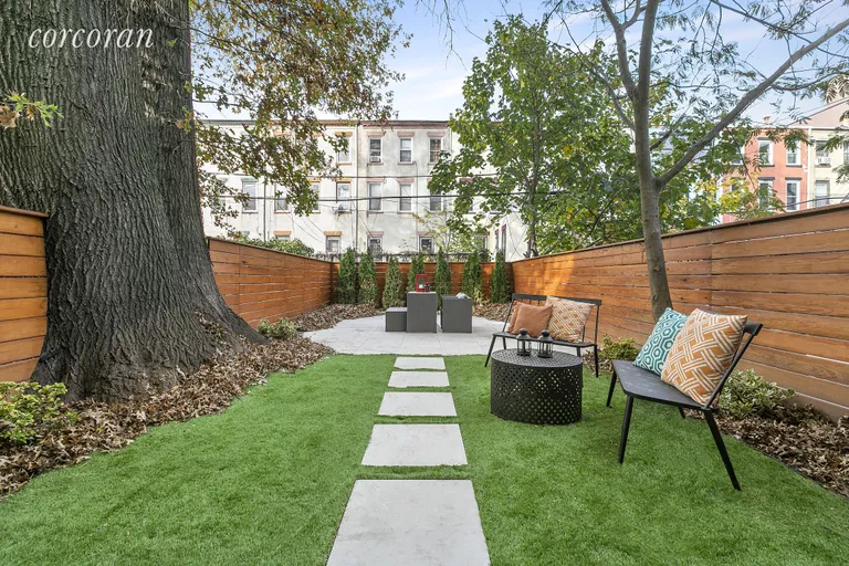 New York City Real Estate | View 213 Halsey Street, 1 | Enormous and magical private backyard! | View 3