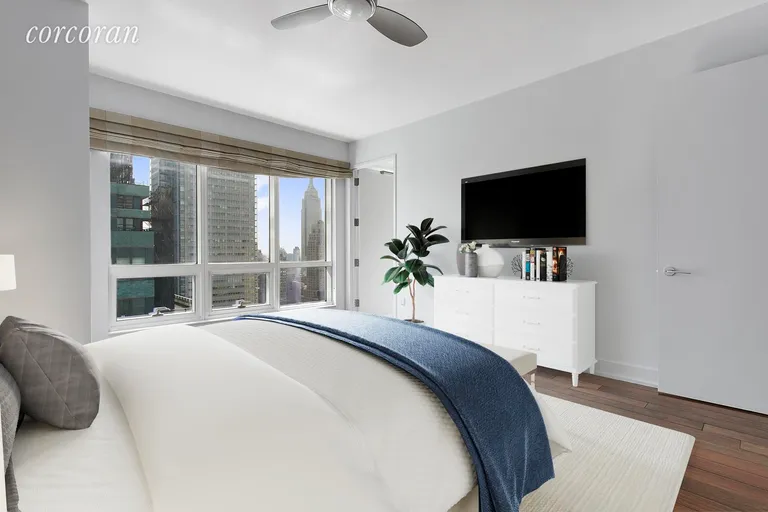 New York City Real Estate | View 350 West 42Nd Street, 44G | Virtually Staged Master Bedroom | View 4