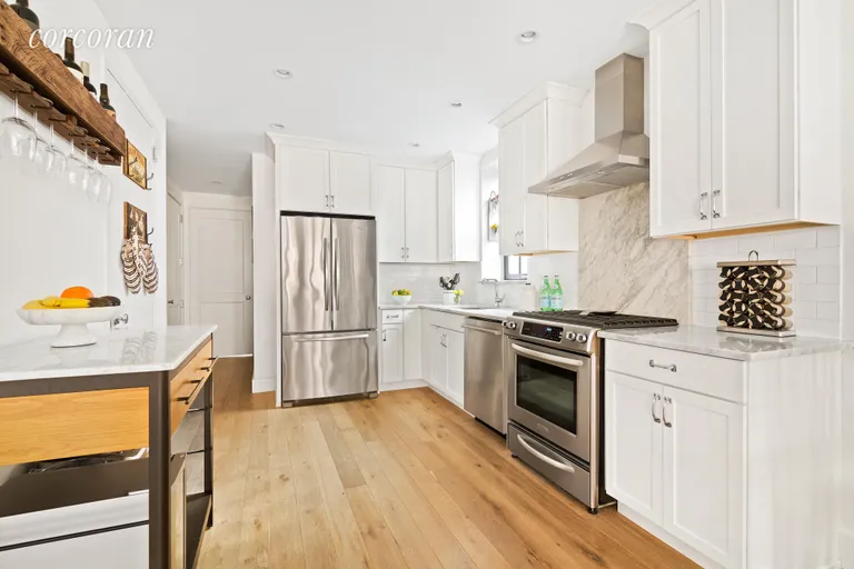 New York City Real Estate | View 9907 Third Avenue, 3A | Kitchen is a chef's dream with high-end appliances | View 3