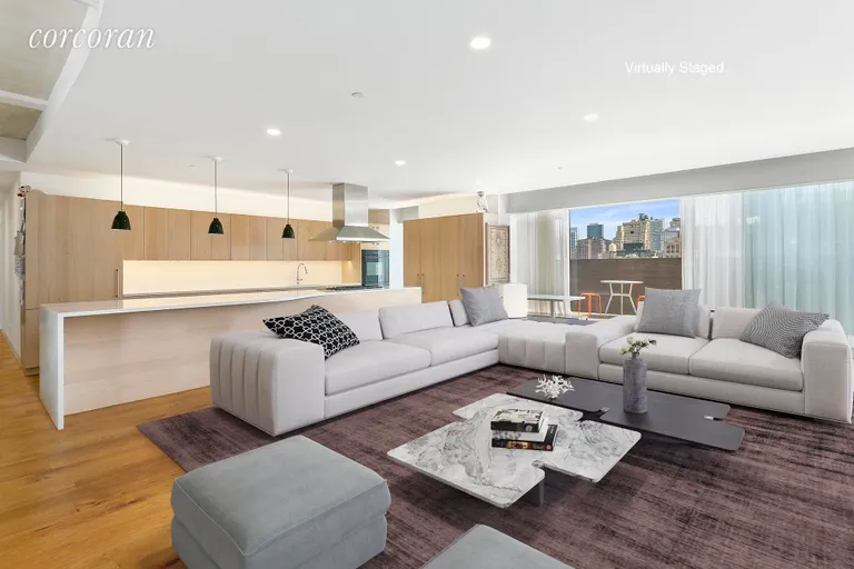 New York City Real Estate | View 217 West 19th Street, 8 FL | North & South Facing Great Room with Open Kitchen | View 2