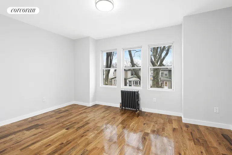 New York City Real Estate | View 69-24 66th Place | Stunning hardwood floors throughout! | View 5