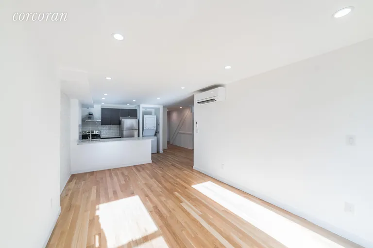 New York City Real Estate | View 1414 Saint Marks Avenue, 1 | Living area drenched with sun | View 3