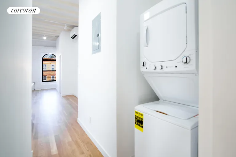 New York City Real Estate | View 1414 Saint Marks Avenue, 3 | Washer and dryer in the hallway | View 14
