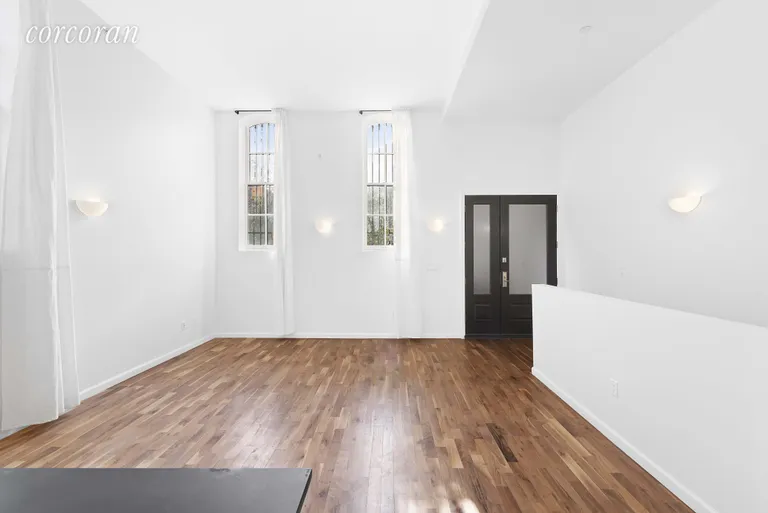 New York City Real Estate | View 145 Gates Avenue, 1 | Large and sunny living room with high ceilings! | View 2