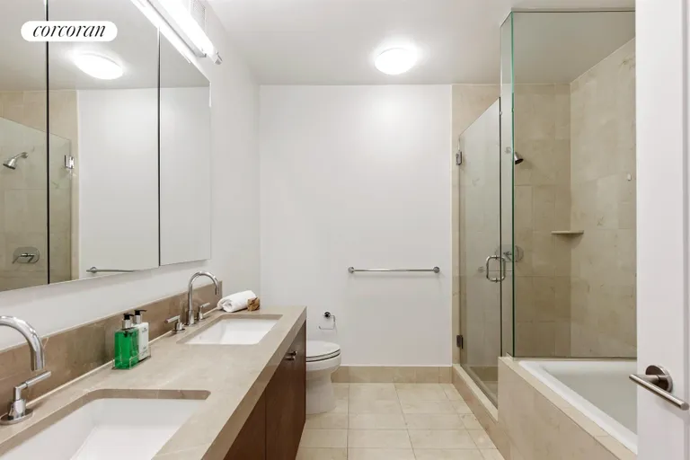 New York City Real Estate | View 30 West Street, 27E | Marble Master Bathroom | View 15
