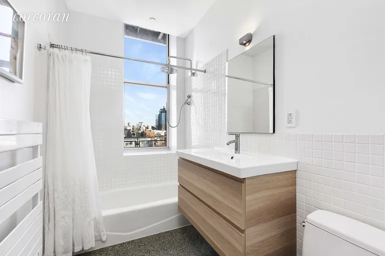 New York City Real Estate | View 129 Lafayette Street, 8C | Windowed Bathroom  | View 6