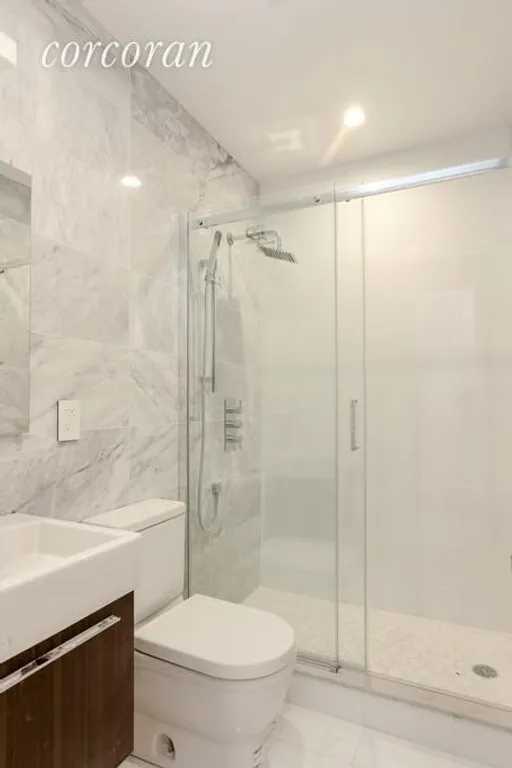 New York City Real Estate | View 211 8th Avenue, 2D | Marble Bathroom  | View 6