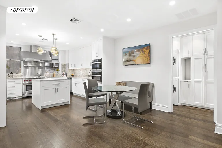New York City Real Estate | View 1001 Park Avenue, 3/4N | 25 foot custom Kitchen easily seats six
 | View 7