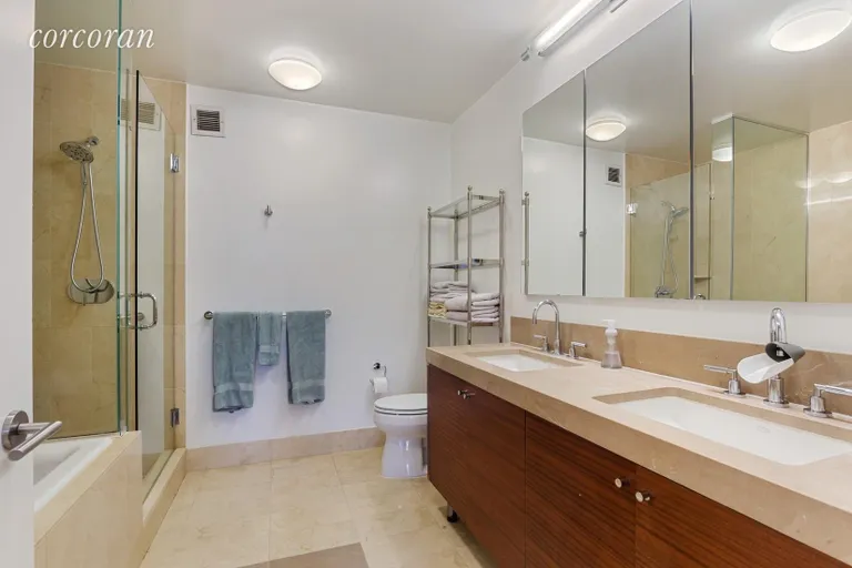 New York City Real Estate | View 30 West Street, 12G | Marble Master Bathroom | View 5