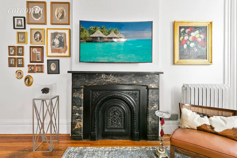 New York City Real Estate | View 331 West 19th Street, 3 | Decorative fireplace in the Master Bedroom | View 13