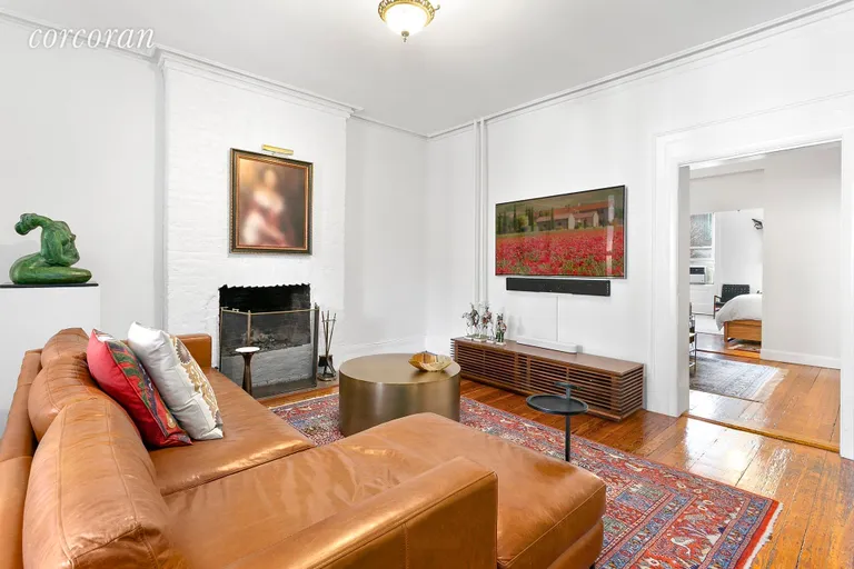 New York City Real Estate | View 331 West 19th Street, 3 | Gorgeous living area with working fireplace  | View 10