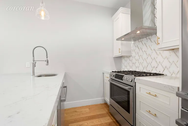 New York City Real Estate | View 140 Jefferson Avenue, 4 | Designer kitchen with tons of prep space! | View 4