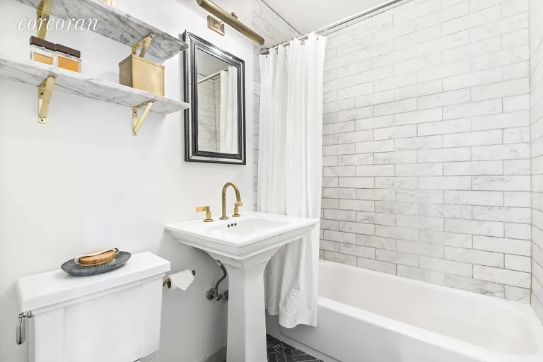 New York City Real Estate | View 85 Stanton Street, 3A | Marble Bathroom with Brass Fixtures  | View 4