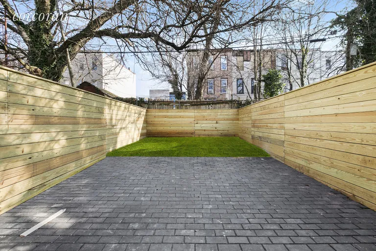 New York City Real Estate | View 1118 Decatur Street | Large, lush garden with new fence! | View 9