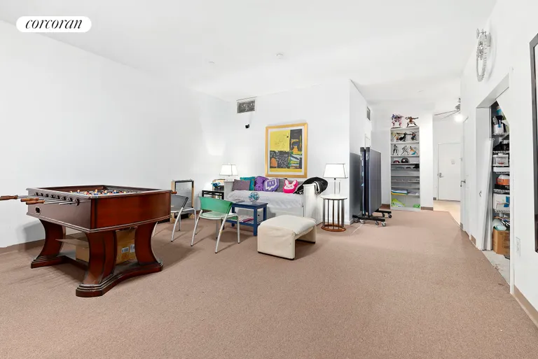 New York City Real Estate | View 321 West 118th Street, 1A | Downstairs Recreation/Storage Space | View 9