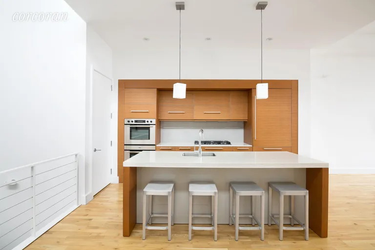New York City Real Estate | View 360 Furman Street, 214 | Chef's Kitchen with 8' Island | View 4