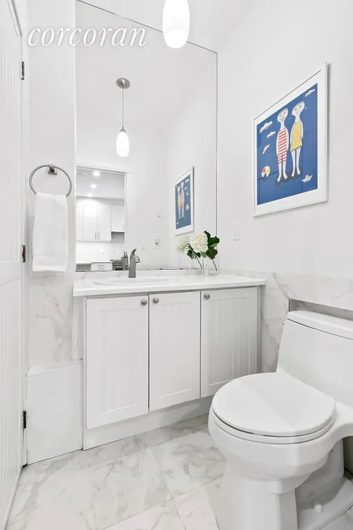 New York City Real Estate | View 680 Carroll Street, 3 | This powder room also houses the washer & dryer. | View 8