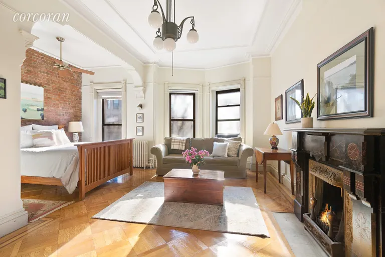 New York City Real Estate | View 199 Saint Johns Place | Master bedroom with wood-burning fireplace | View 5