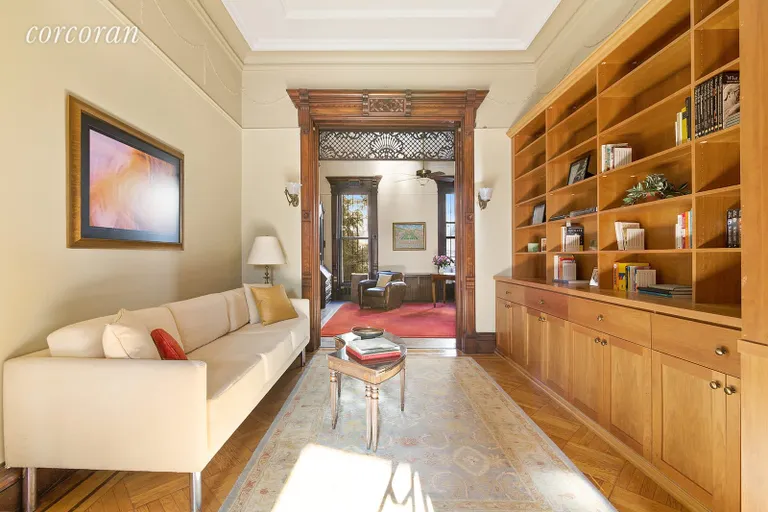 New York City Real Estate | View 199 Saint Johns Place | Front parlor with built-in bookshelves | View 3