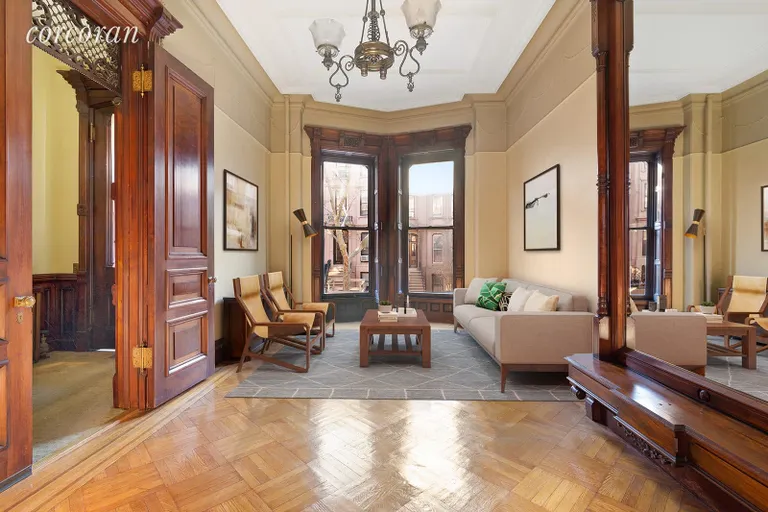 New York City Real Estate | View 199 Saint Johns Place | Parlor floor with high ceilings and pier mirror | View 2