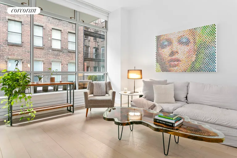 New York City Real Estate | View 139 Wooster Street, 3B | 11 ft ceilings and giant windows
    
        | View 2