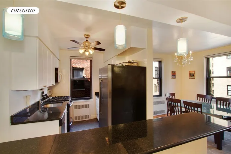 New York City Real Estate | View 30 East 9th Street, 6B | Beautiful renovated open kitchen with brekfast bar | View 3