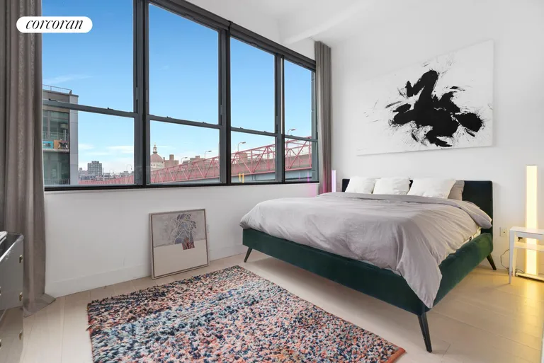 New York City Real Estate | View 338 Berry Street, 4D | primary bedroom with 'city quiet' windows | View 4