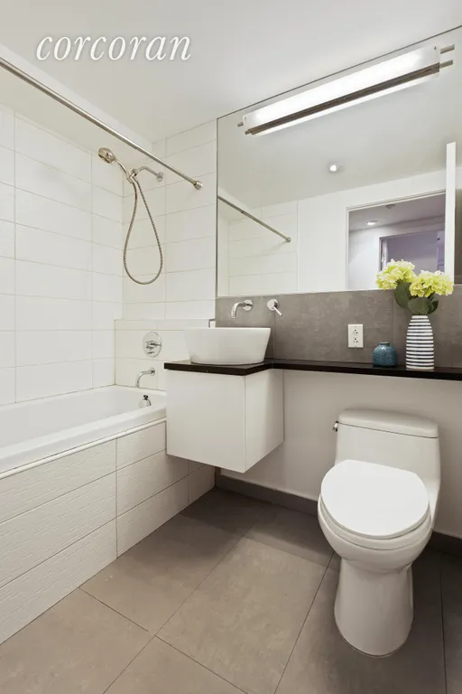 New York City Real Estate | View 317 16th Street, 3A | Hall Bath Features a Deep Soaking Tub | View 9