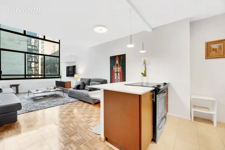 New York City Real Estate | View 171 East 84th Street, 4D2 | Kitchen and Living Room | View 3