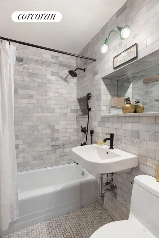 New York City Real Estate | View 185 Hall Street, 1008 | Updated bathroom w/ marble penny + subway tiles | View 6