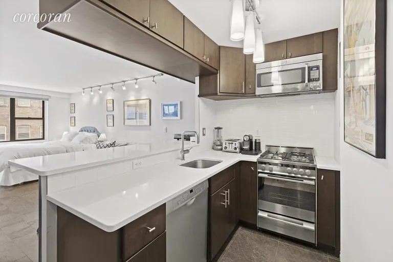 New York City Real Estate | View 7 East 14th Street, 1021 | Renovated stainless steel appointed kitchen  | View 3