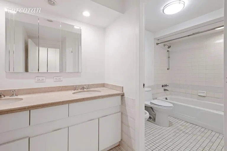 New York City Real Estate | View 40 East 61st Street, 11A | En suite bathroom with double sinks | View 4