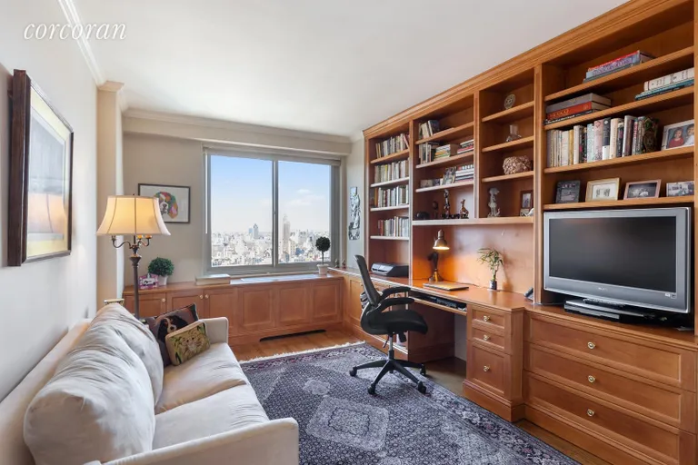 New York City Real Estate | View 300 East 74th Street, 36F | 2nd Bedroom | Office | Custom, Built-in Bookcases | View 9