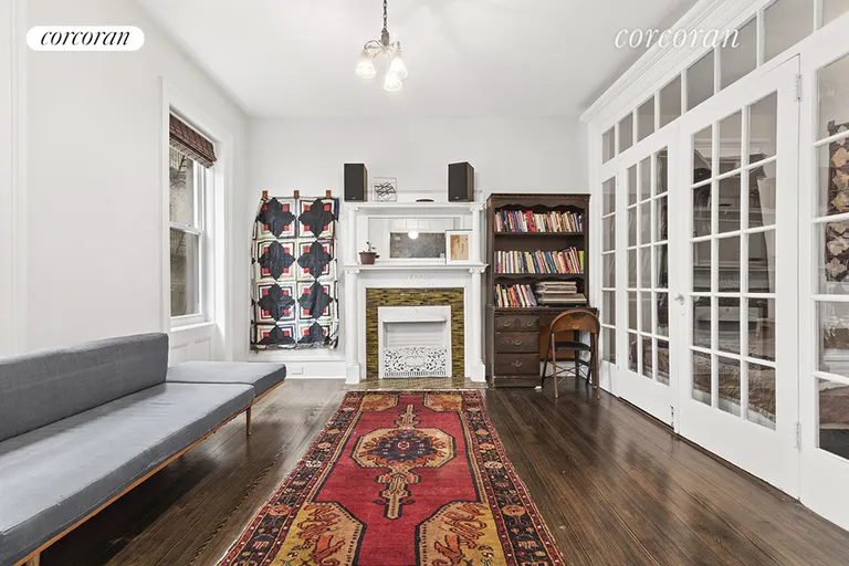 New York City Real Estate | View 353 West 117th Street, 3E | Gorgeous original fireplace lovingly restored | View 3