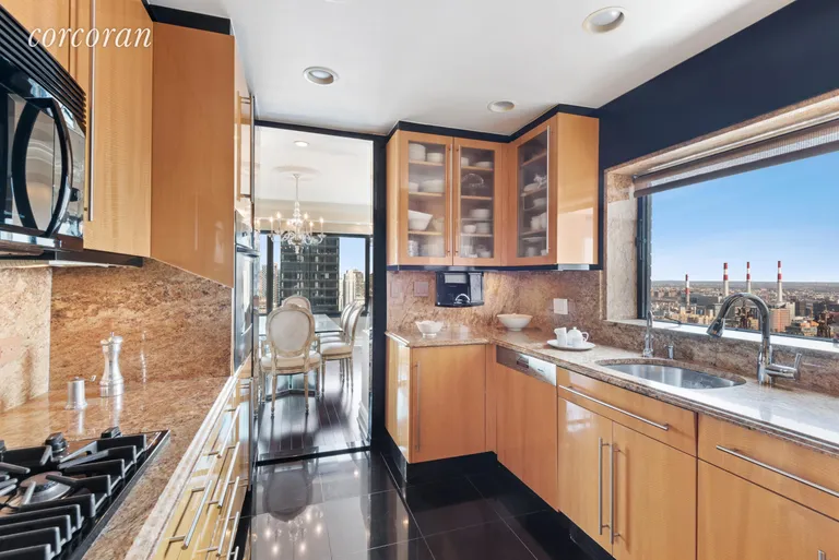 New York City Real Estate | View 425 East 58th Street, 33B | Renovated Kitchen with Top of the Line Appliances | View 4