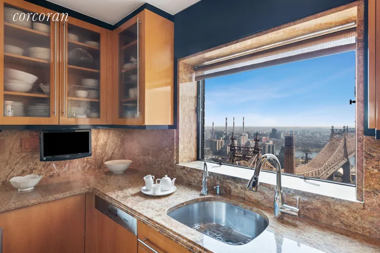 New York City Real Estate | View 425 East 58th Street, 33B | Kitchen with a View! | View 5