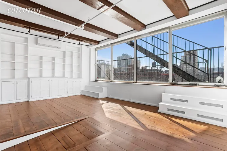 New York City Real Estate | View 8 East 12th Street, 8/9 | Living Room with Southern Exposure | View 9
