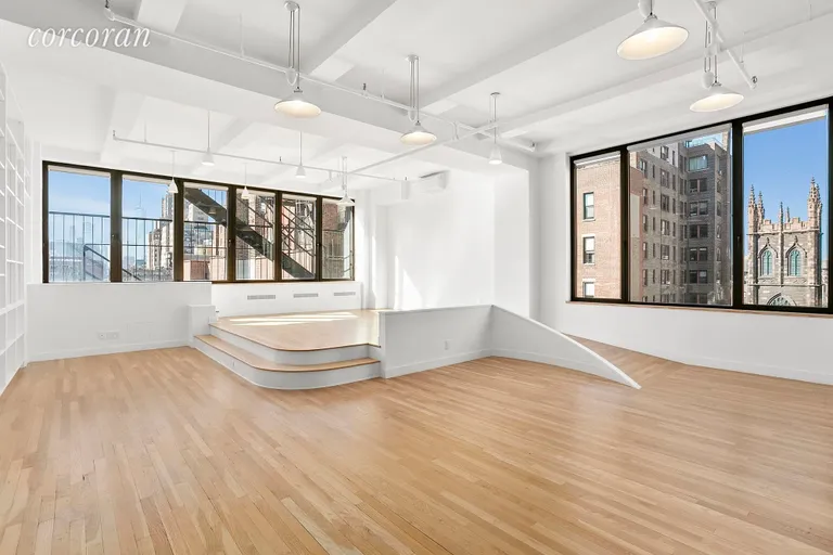 New York City Real Estate | View 8 East 12th Street, 8/9 | Living Room with Southern Exposure | View 13