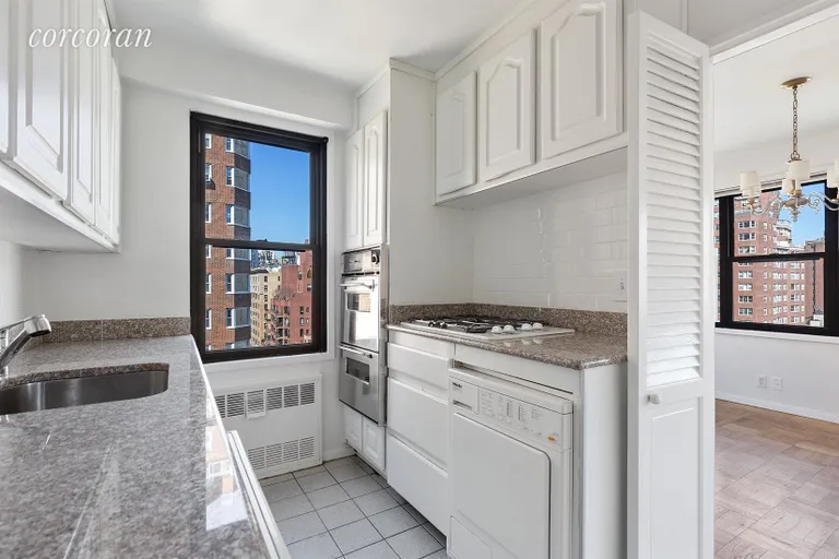 New York City Real Estate | View 200 East 74th Street, 12E | Dual-entry, Windowed Kitchen with Washer/Dryer | View 4