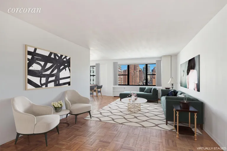 New York City Real Estate | View 200 East 74th Street, 12E | Enormous Living Room with Wraparound Windows | View 2