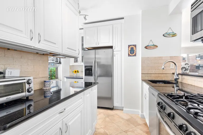 New York City Real Estate | View 40 East 9th Street, 5A | Windowed Kitchen w/ Stainless Steel Appliances | View 2